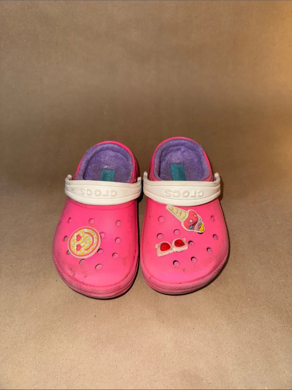 CROCS pink kids clogs with purple fleece lining and white straps